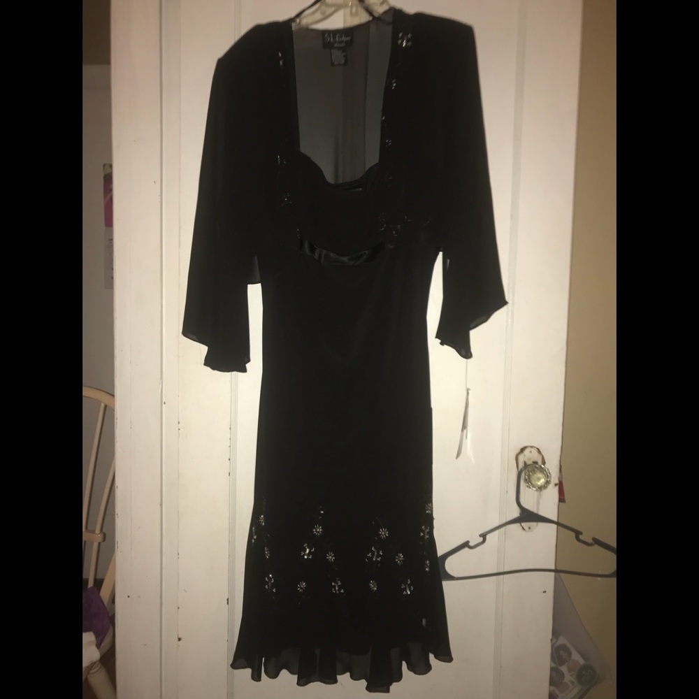 Black evening dress with sheer jacket